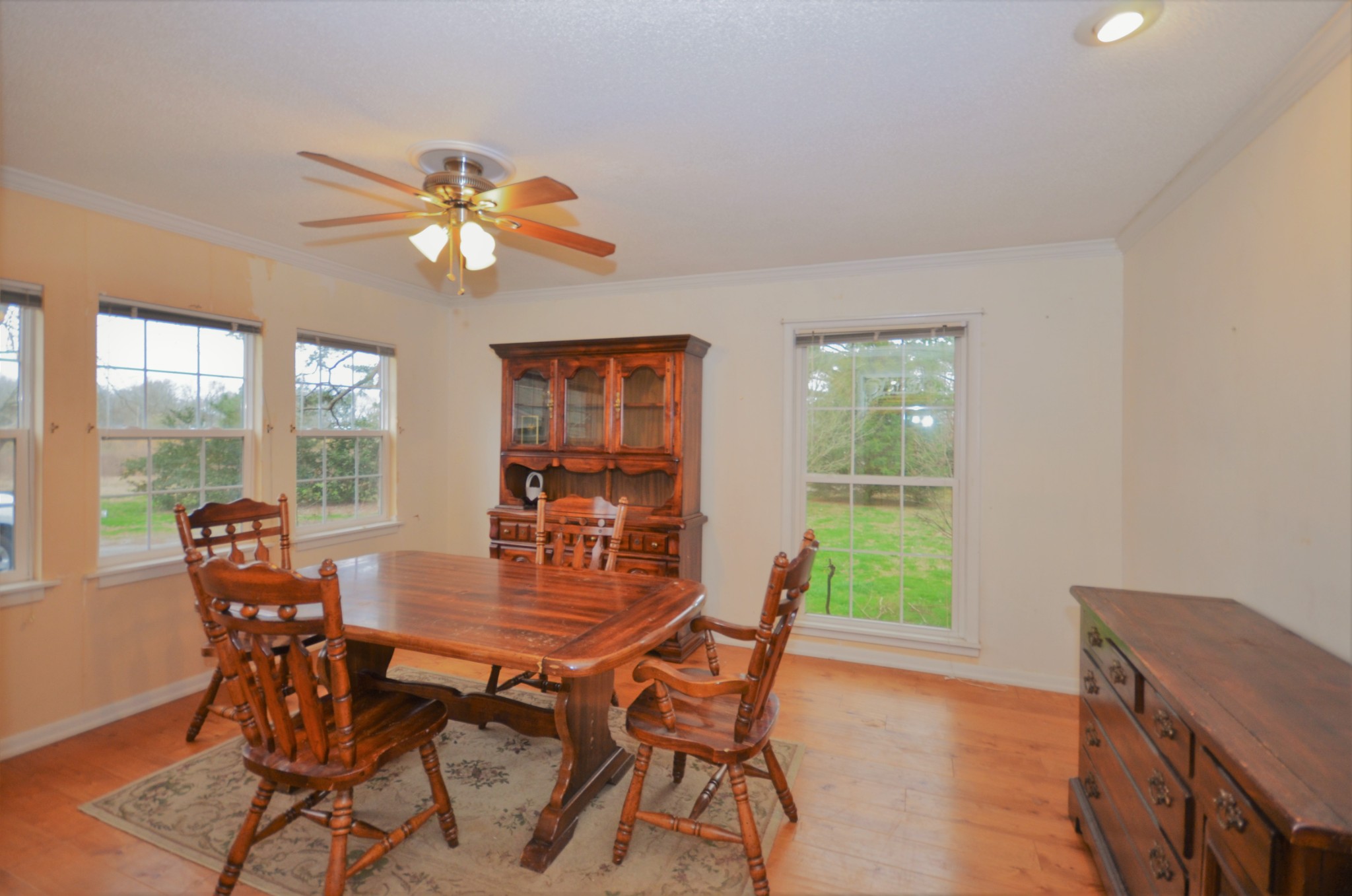 30 Remke Road Lawrenceburg, TN 38464 - Photo 14 of 49 a dining room with furniture a chandelier and wooden floor