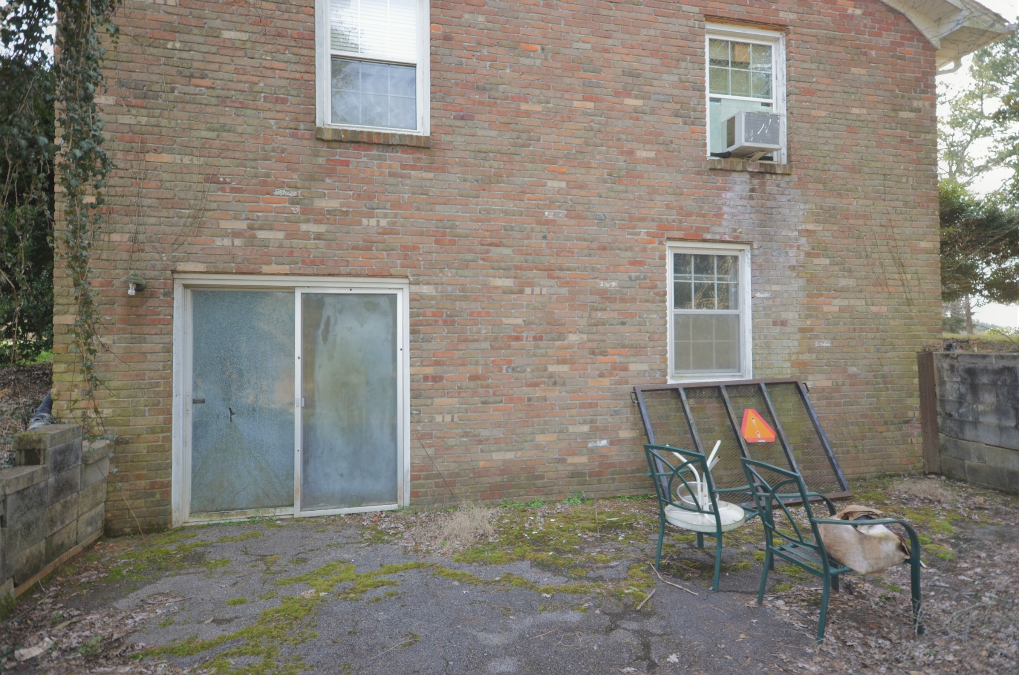 30 Remke Road Lawrenceburg, TN 38464 - Photo 47 of 49 a brick house with table and chairs in front of it