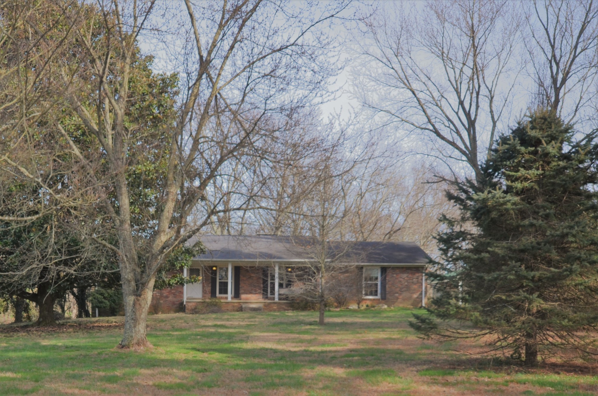30 Remke Road Lawrenceburg, TN 38464 - Photo 8 of 49 a front view of a house with a garden