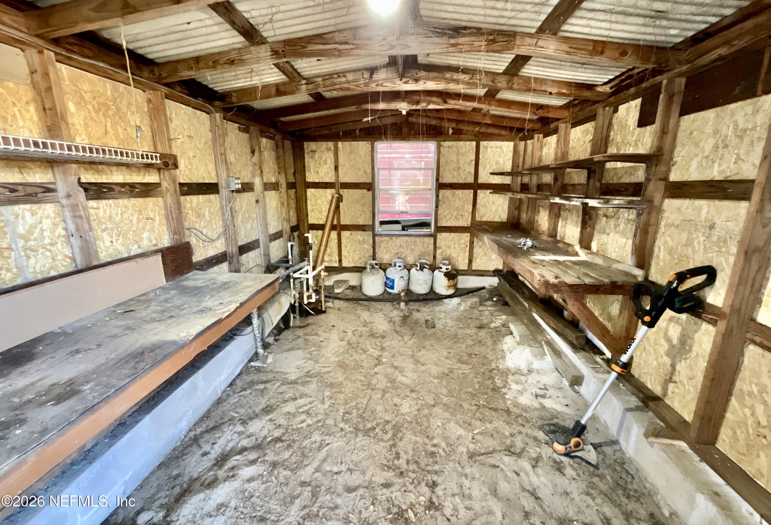 111 2nd Street Melrose, FL 32666 - Photo 32 of 36 a view of a room with gym equipment