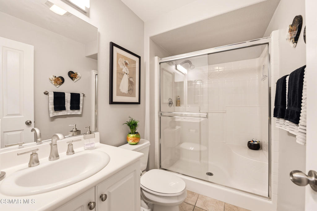 2964 Camelita Way, Unit C Simi Valley, CA 93063 - Photo 14 of 42 a bathroom with a sink toilet and shower