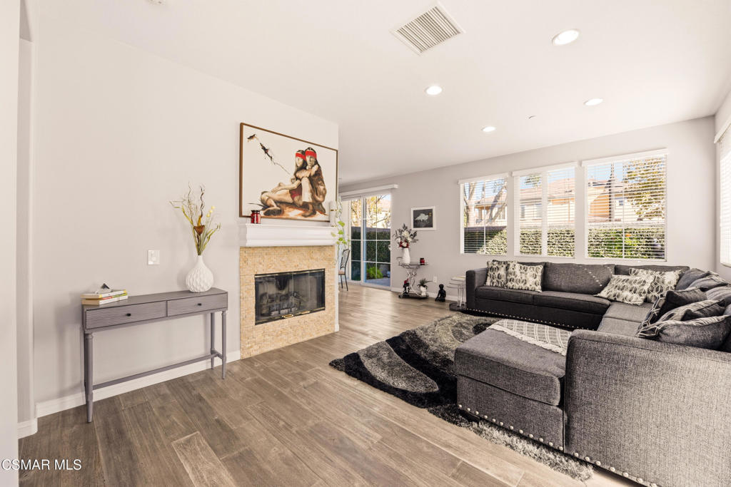 2964 Camelita Way, Unit C Simi Valley, CA 93063 - Photo 2 of 42 a living room with furniture and a fireplace