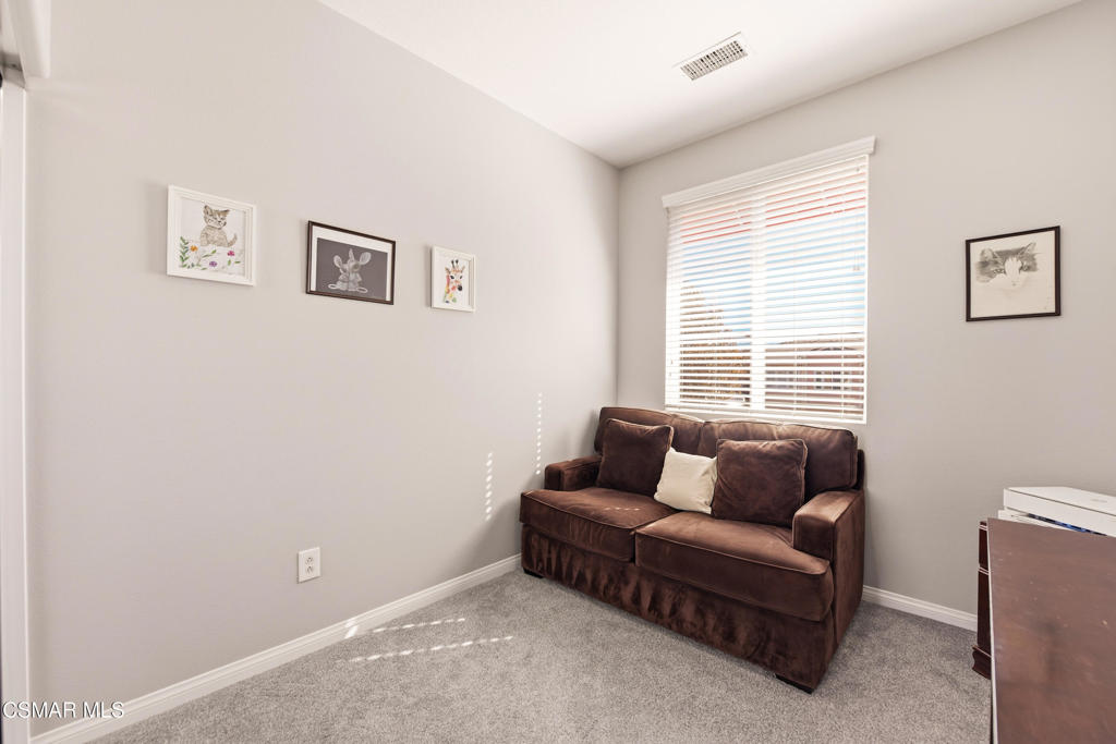 2964 Camelita Way, Unit C Simi Valley, CA 93063 - Photo 22 of 42 a living room with furniture and a window