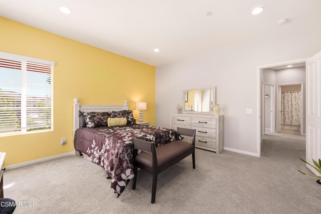 2964 Camelita Way, Unit C Simi Valley, CA 93063 - Photo 24 of 42 a bedroom with a bed and a cabinets