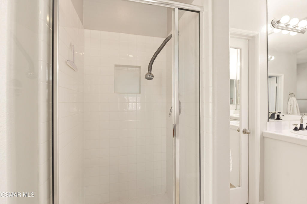 2964 Camelita Way, Unit C Simi Valley, CA 93063 - Photo 29 of 42 a bathroom with a shower and a glass door