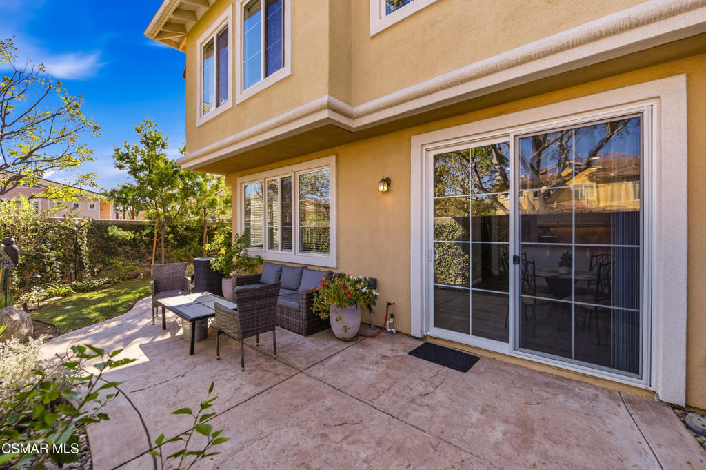 2964 Camelita Way, Unit C Simi Valley, CA 93063 - Photo 32 of 42 a view of a building with a potted plant and a porch