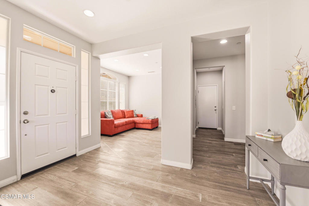 2964 Camelita Way, Unit C Simi Valley, CA 93063 - Photo 5 of 42 a view of a bedroom with furniture and wooden floor