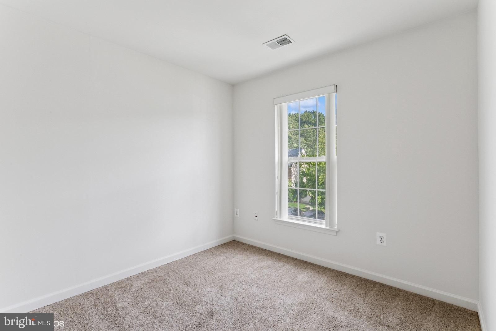 7315 Serenade Circle Clinton, MD 20735 - Photo 21 of 36 an empty room with windows