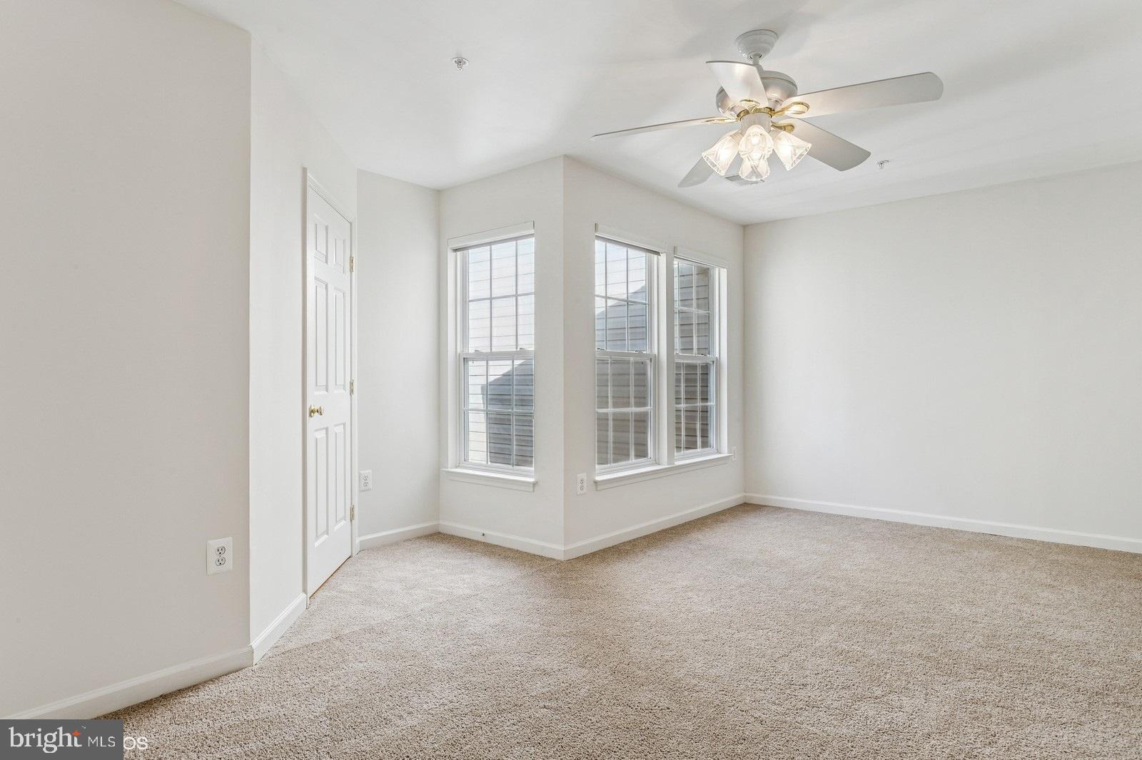 7315 Serenade Circle Clinton, MD 20735 - Photo 29 of 36 an empty room with windows