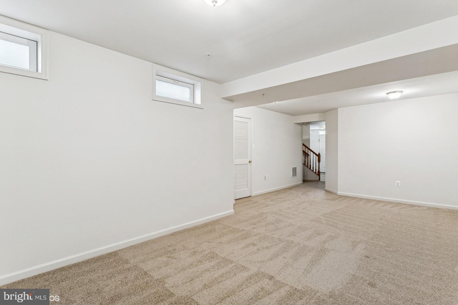 7315 Serenade Circle Clinton, MD 20735 - Photo 6 of 36 an empty room with an entryway