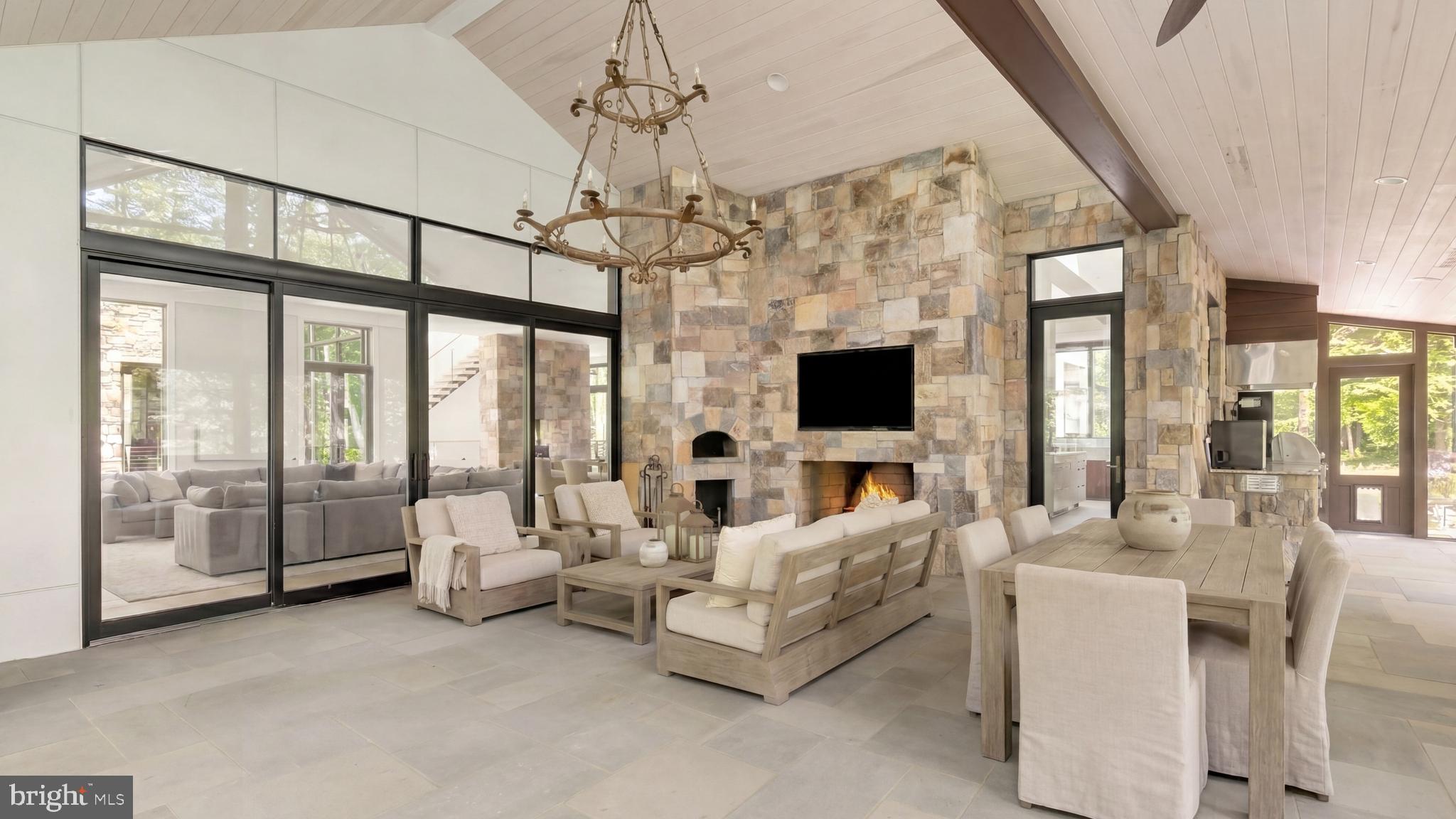 3 Bay Tree Lane Bethesda, MD 20816 - Photo 12 of 48 Screened porch w/ FP, grill & pizza oven
