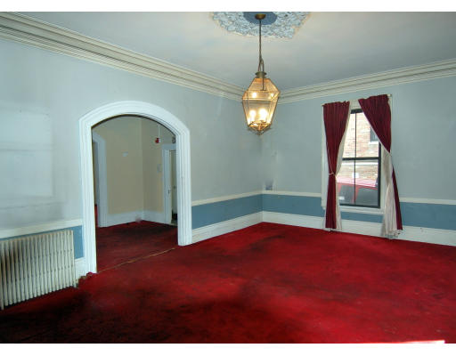 44 Follen Street Cambridge, MA 02138 - Photo 4 of 7 a view of empty room with window