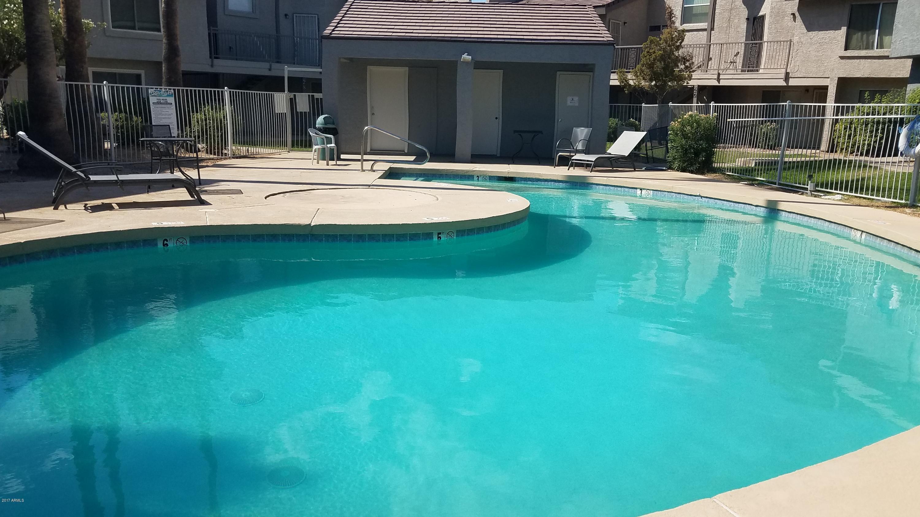 19601 North 7th Street, Unit 1049 Phoenix, AZ 85024 - Photo 21 of 26 a view of a house with swimming pool