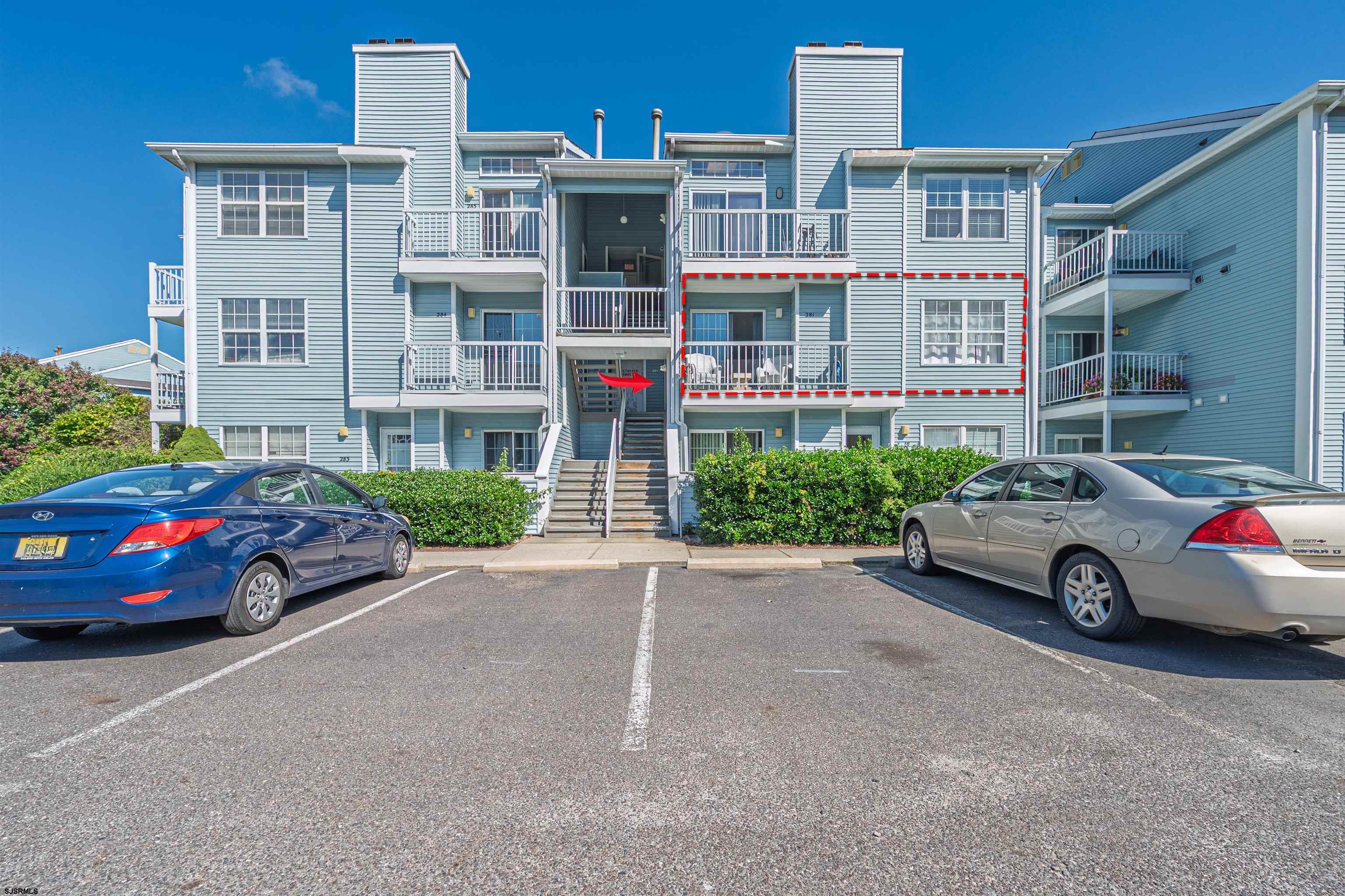 a car parked in front of a house
