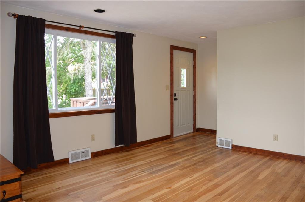 5 Hays Street Rural Ridge, PA 15075 - Photo 2 of 19 Step into the freshly ainted living room with original hardwood floor, recessed lights & picture window