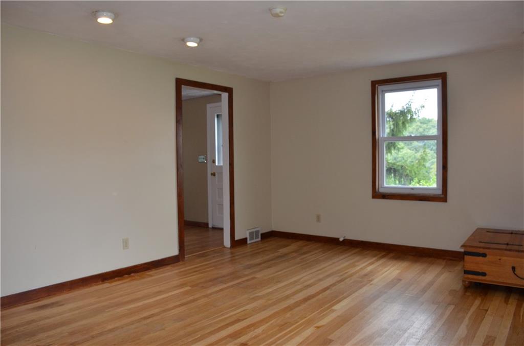 5 Hays Street Rural Ridge, PA 15075 - Photo 3 of 19 Living room leads to eat in kitchen