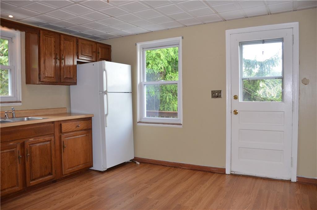 5 Hays Street Rural Ridge, PA 15075 - Photo 5 of 19 Kitchen door leads to the wrapping deck
