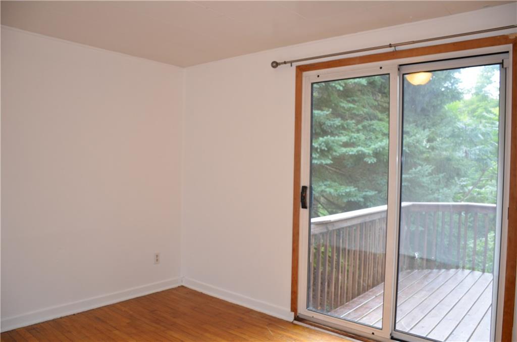 5 Hays Street Rural Ridge, PA 15075 - Photo 7 of 19 Next bedroom has hardwood floor, overhead light & slider to the deck