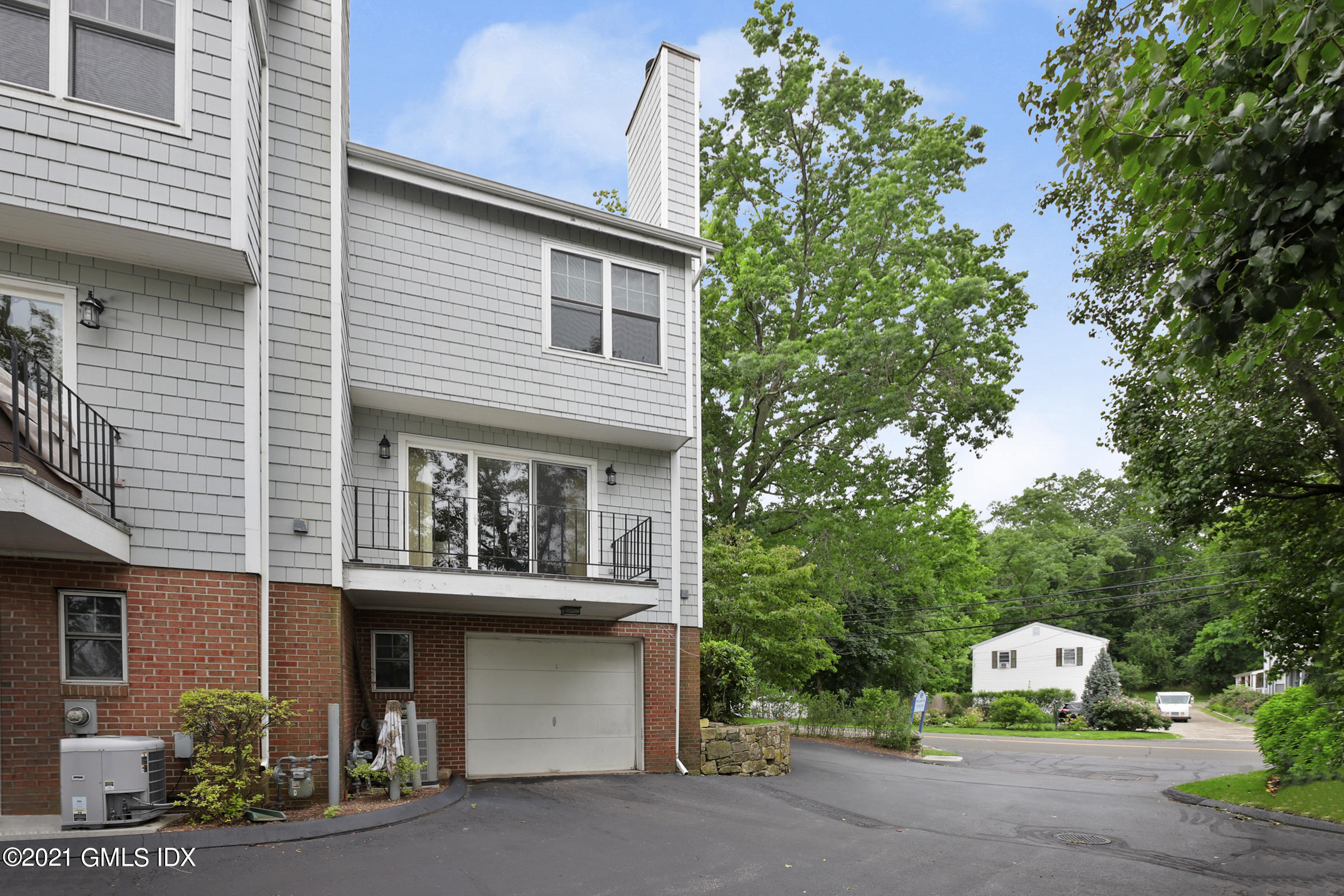 100 Strickland Road, Unit 1 Cos Cob, CT 06807 - Photo 18 of 29 a house with a outdoor space