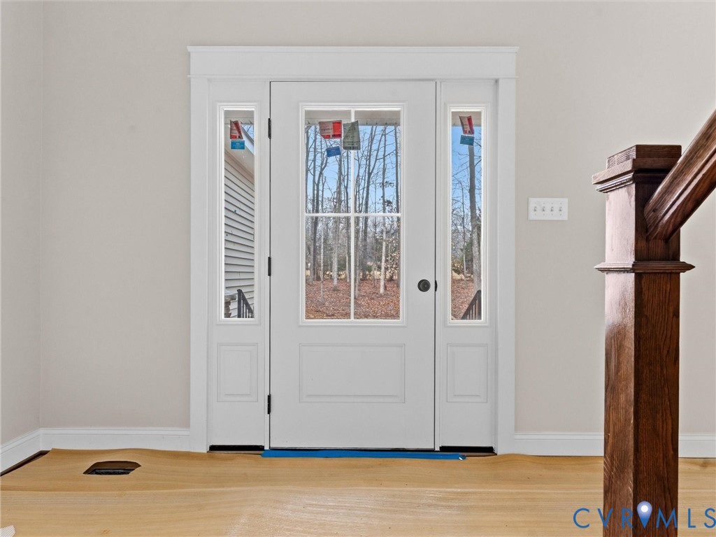1545 Palmore Road Powhatan, VA 23139 - Photo 15 of 38 a view of an entryway with wooden floor
