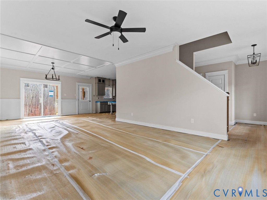 1545 Palmore Road Powhatan, VA 23139 - Photo 18 of 38 a view of a livingroom with a ceiling fan