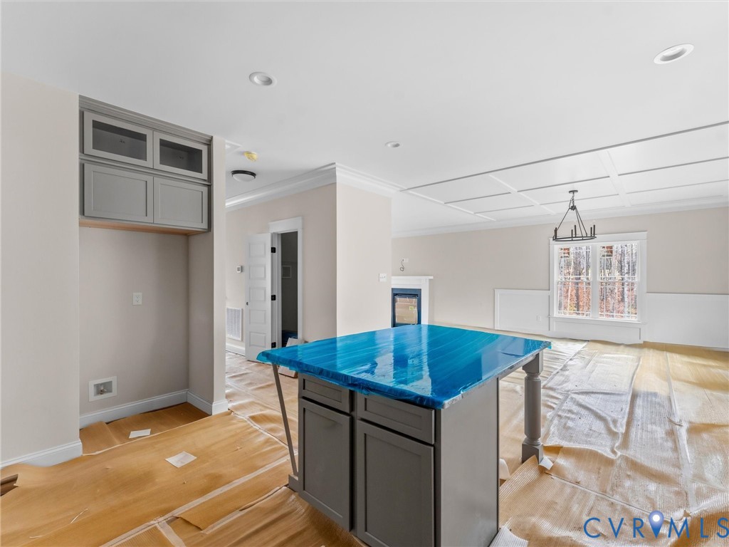 1545 Palmore Road Powhatan, VA 23139 - Photo 24 of 38 a kitchen with stainless steel appliances granite countertop a sink and cabinets