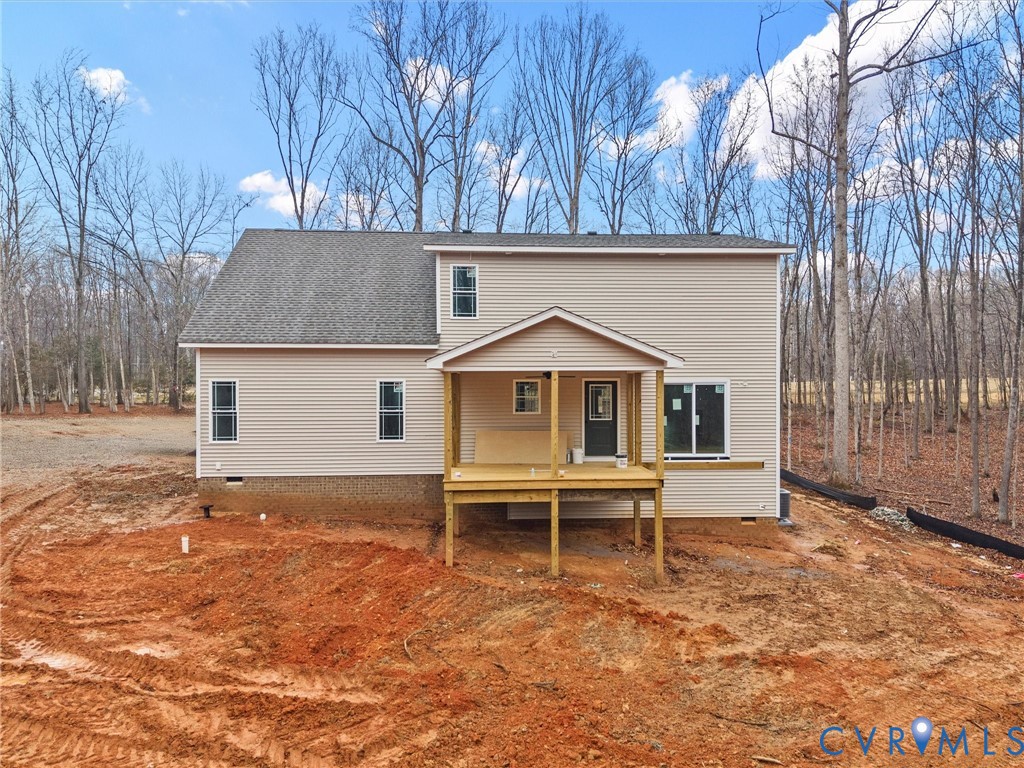 1545 Palmore Road Powhatan, VA 23139 - Photo 3 of 38 a view of a house with a yard chairs and wooden fence
