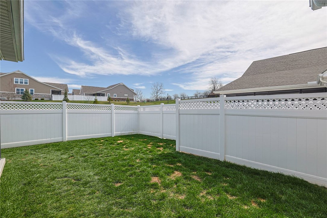5013 Arena Court Hamilton, OH 45011 - Photo 34 of 41 This spacious backyard features a pristine fence, perfect for outdoor enjoyment.