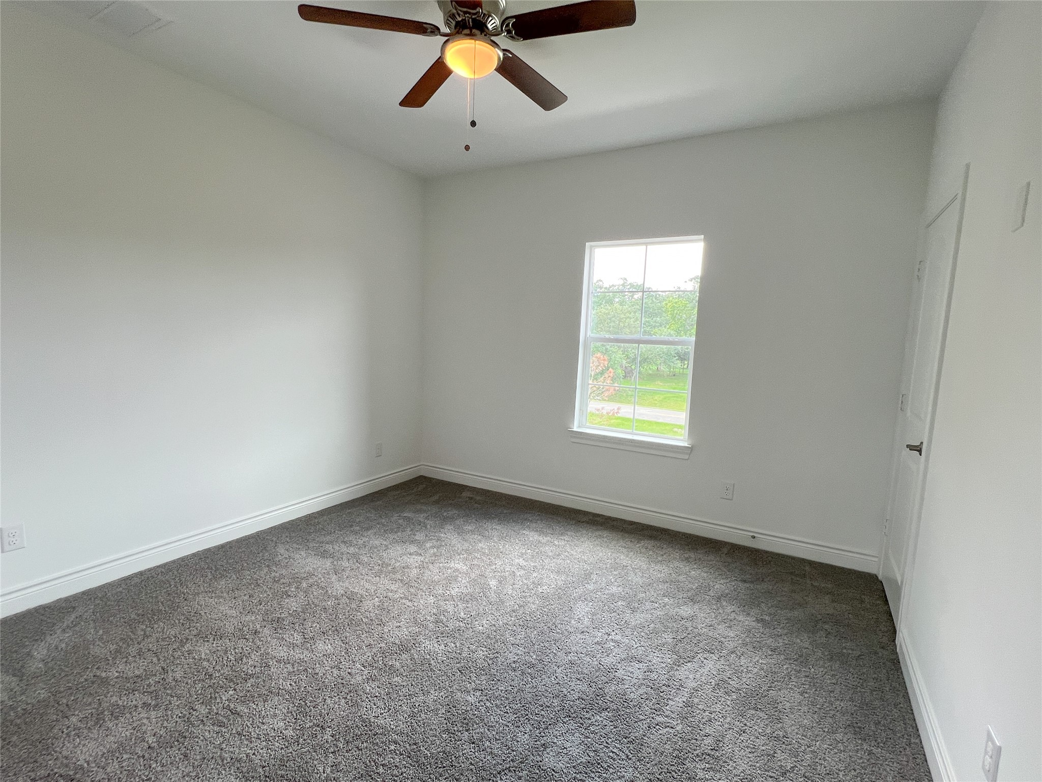 126 Lakeland Circle Rosharon, TX 77583 - Photo 34 of 49 an empty room with windows
