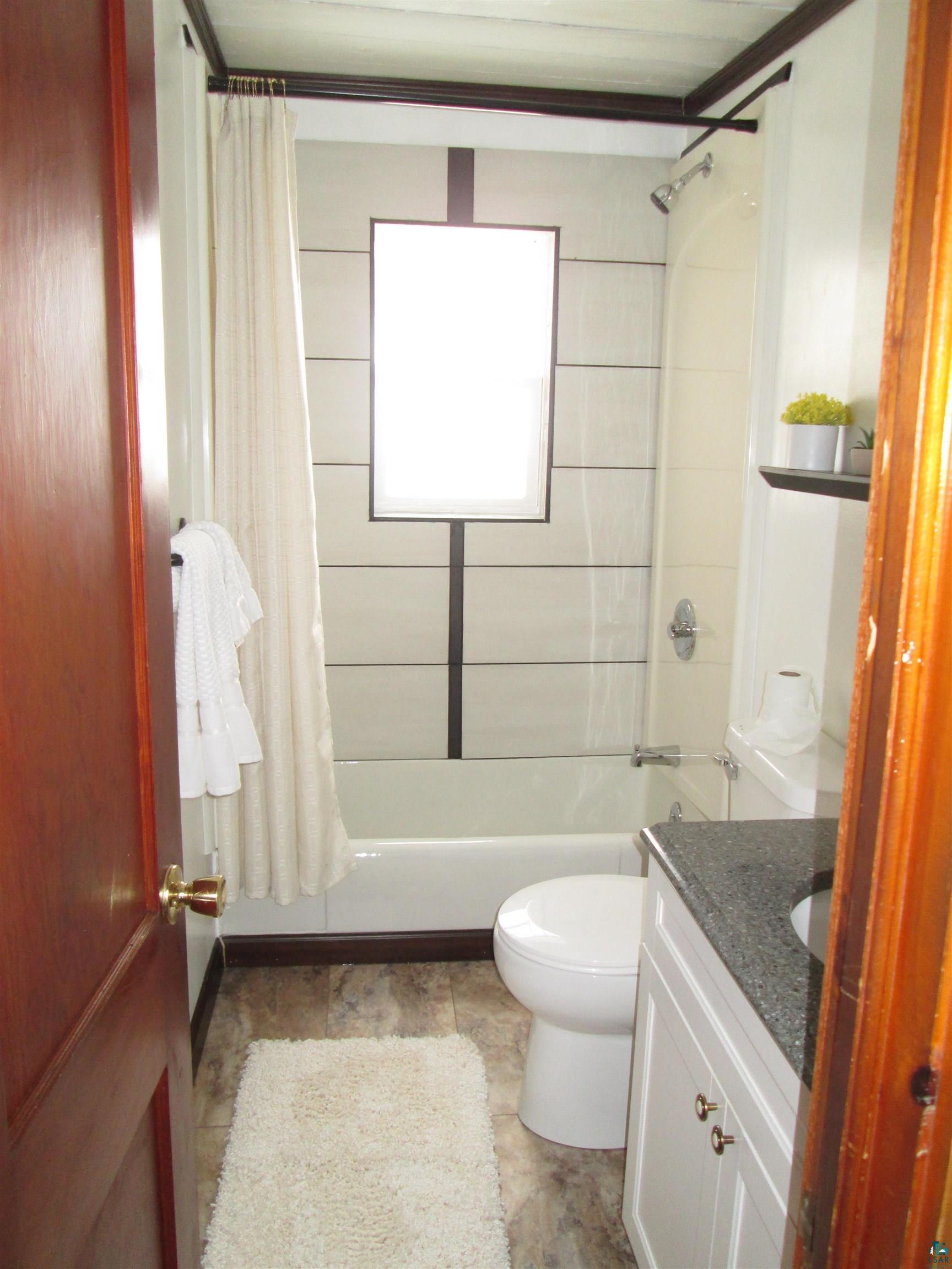 9255 East West Homestead Road Poplar, WI 54864 - Photo 12 of 48 1st floor bathroom