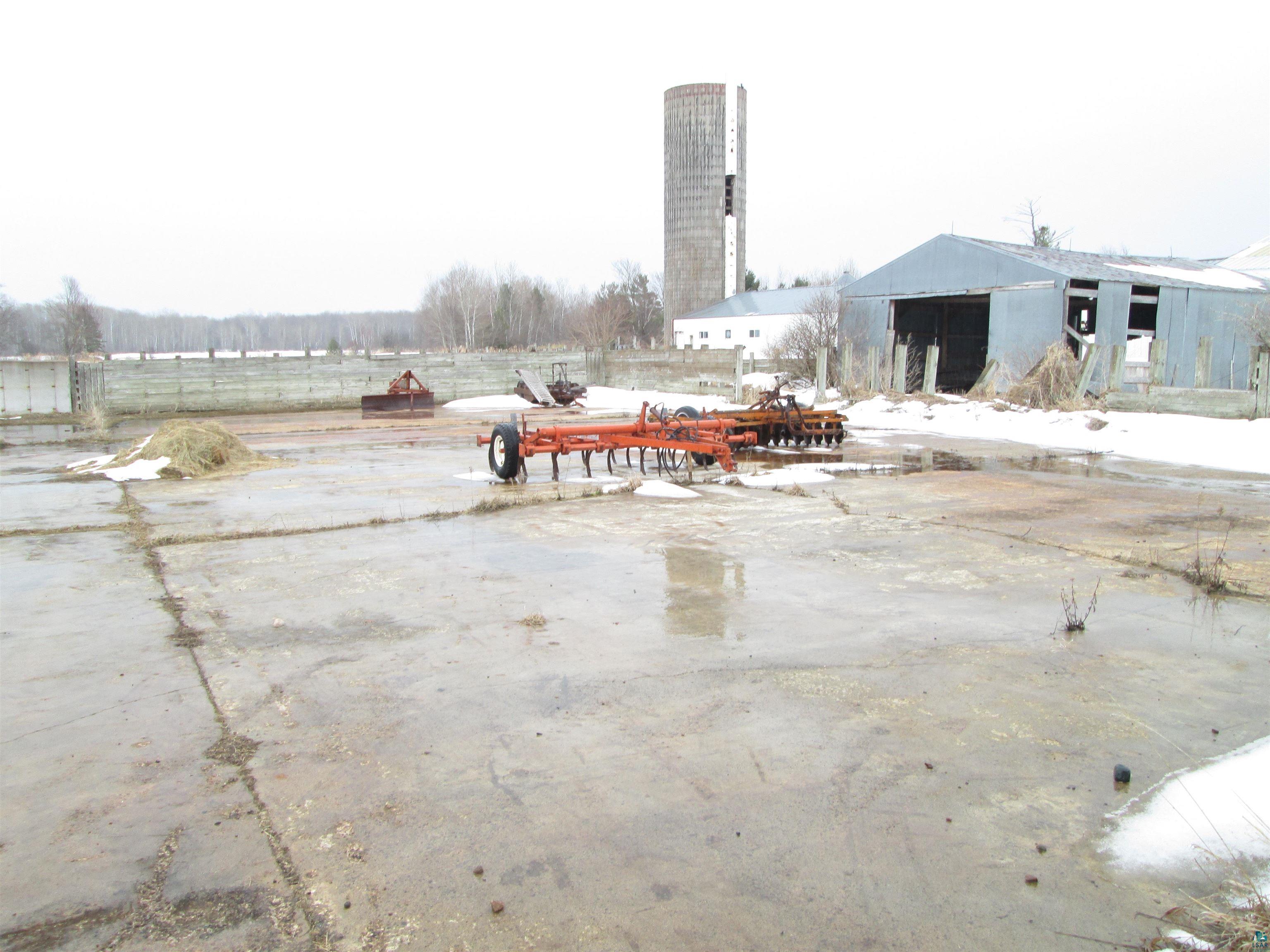 9255 East West Homestead Road Poplar, WI 54864 - Photo 36 of 48 106' x 106' manure pit