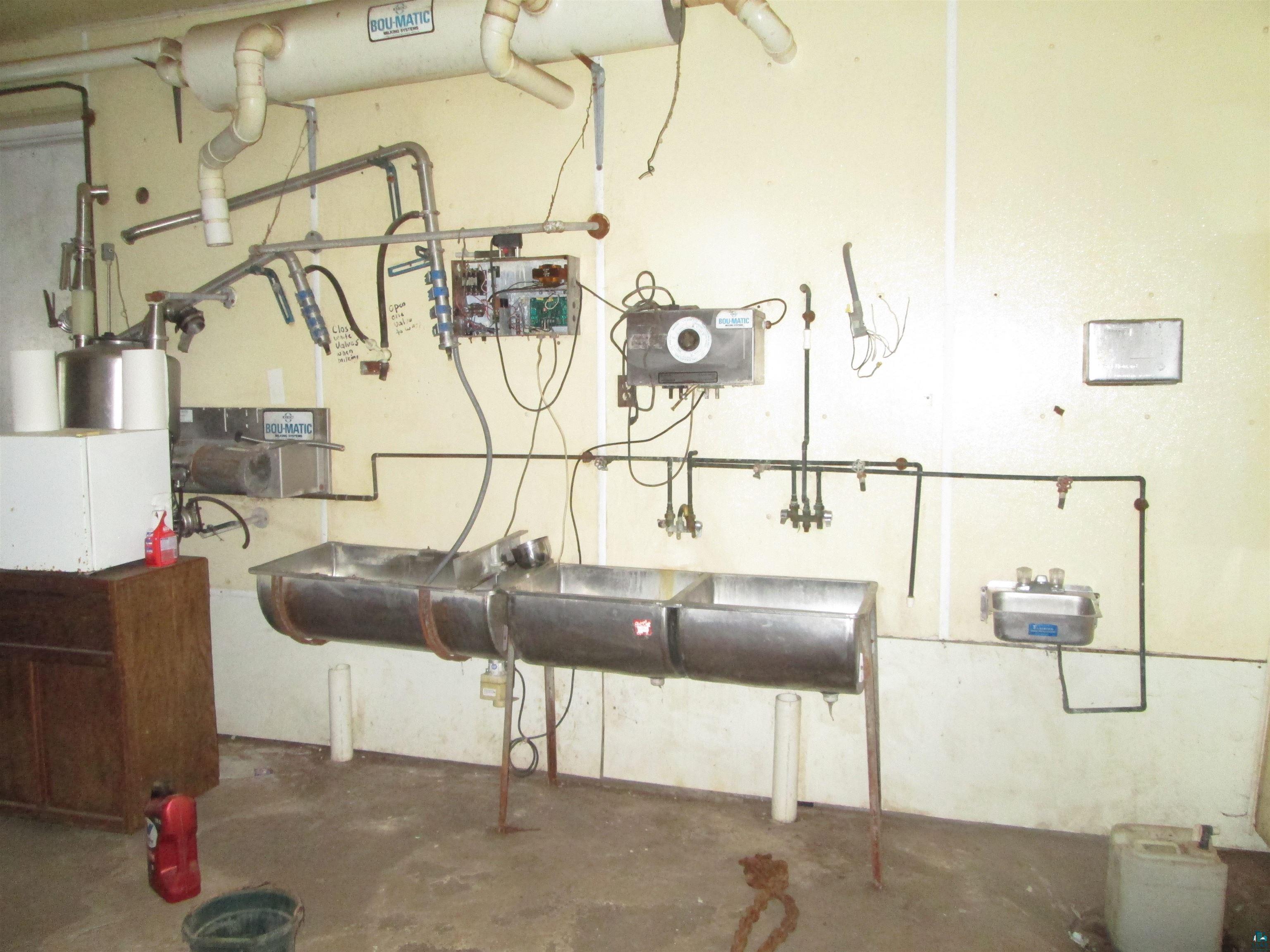 9255 East West Homestead Road Poplar, WI 54864 - Photo 41 of 48 milkhouse