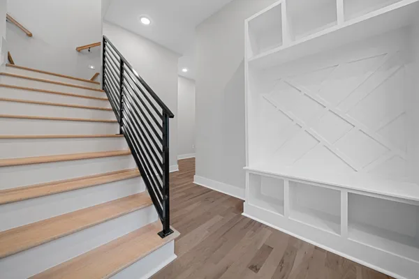 a view of entryway with wooden floor