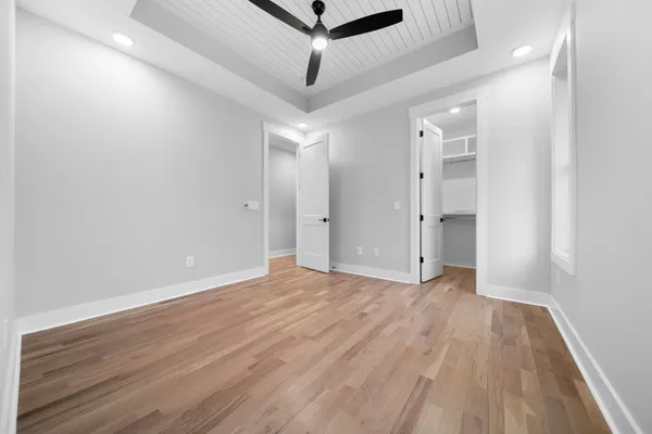 a view of a livingroom with wooden floor