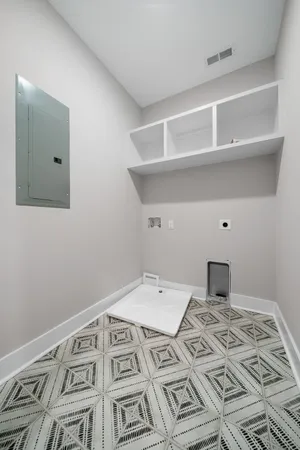 a view of a bedroom with a bed