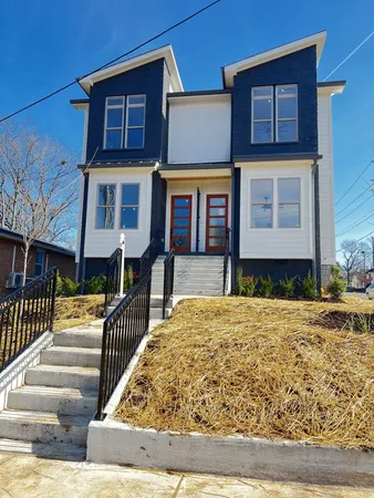 a front view of a house with a porch