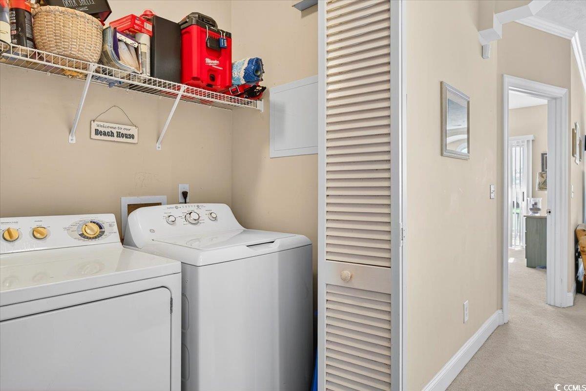 131 Waypoint Ridge Avenue, Unit 24 Little River, SC 29566 - Photo 16 of 39 Laundry room featuring carpet flooring and washer and clothes dryer