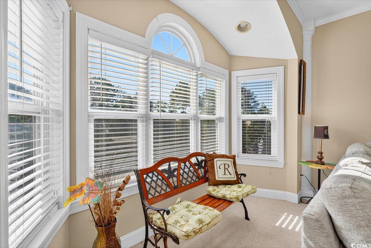 131 Waypoint Ridge Avenue, Unit 24 Little River, SC 29566 - Photo 24 of 39 Bedroom with light carpet, vaulted ceiling, and crown molding