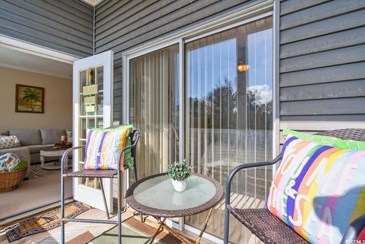 131 Waypoint Ridge Avenue, Unit 24 Little River, SC 29566 - Photo 27 of 39 View of sunroom / solarium