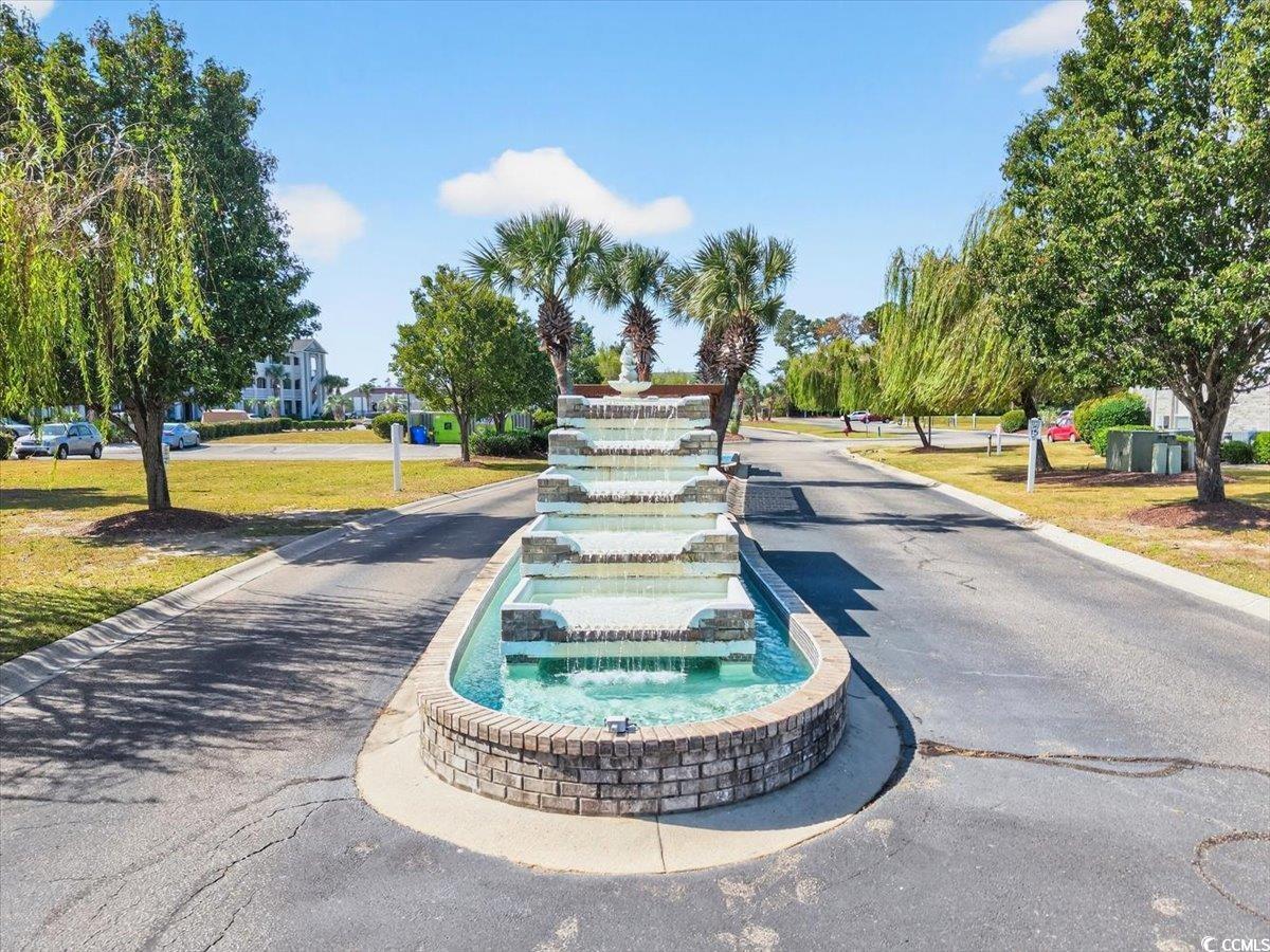 131 Waypoint Ridge Avenue, Unit 24 Little River, SC 29566 - Photo 3 of 39 View of home's community with a yard