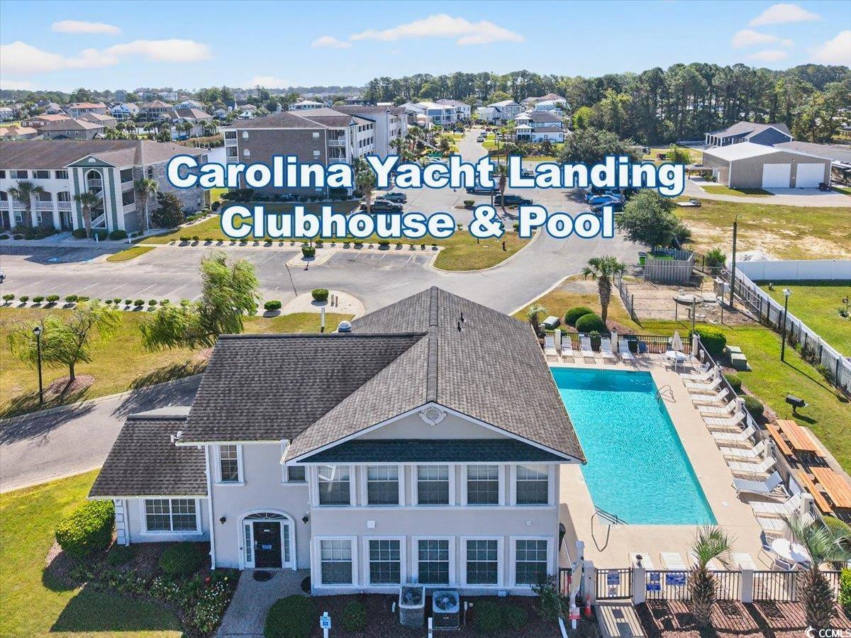 131 Waypoint Ridge Avenue, Unit 24 Little River, SC 29566 - Photo 36 of 39 Drone / aerial view of a pool area