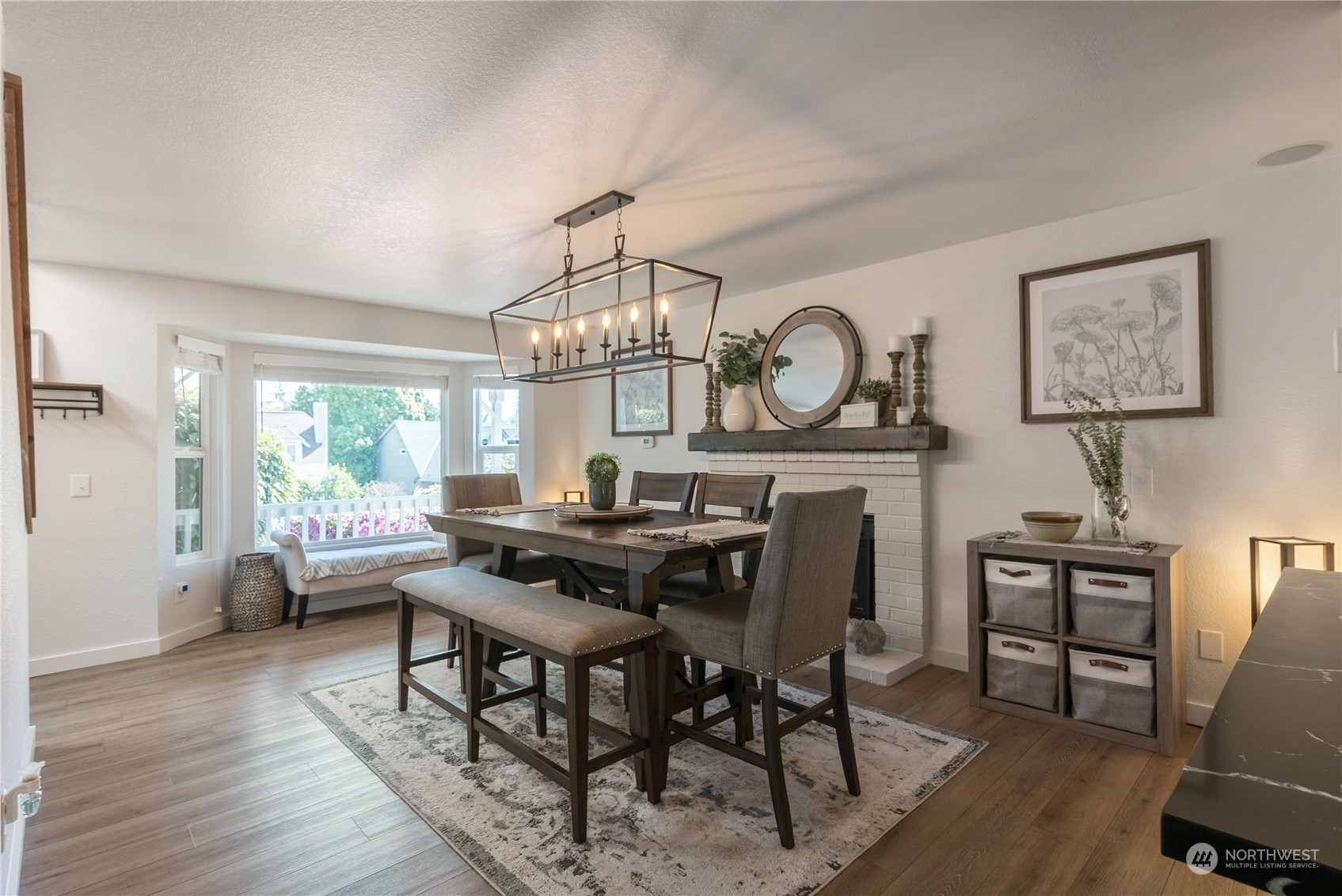 16520 4th Drive Southeast Bothell, WA 98012 - Photo 3 of 32 a view of a dining room with furniture window and wooden floor