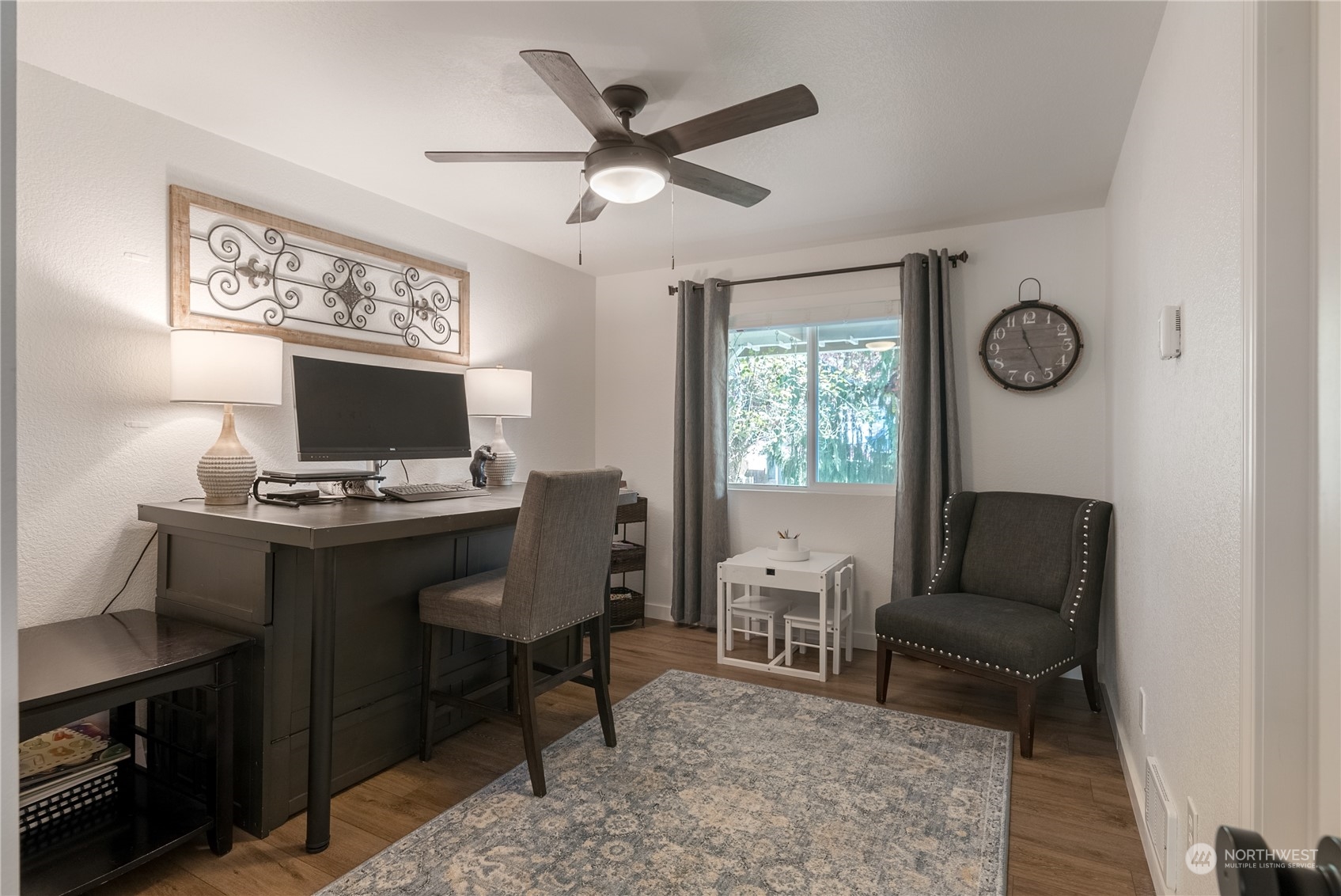 16520 4th Drive Southeast Bothell, WA 98012 - Photo 9 of 32 a view of a workspace with furniture and a window