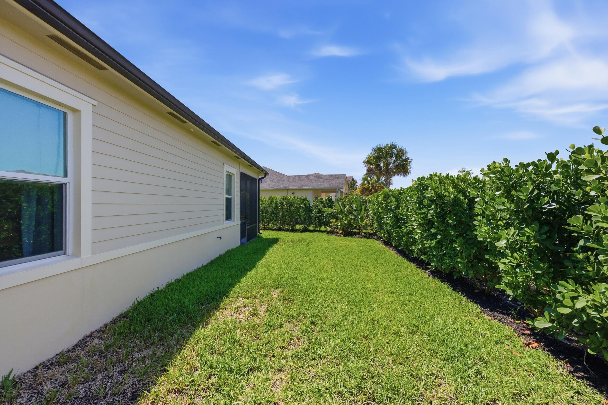 19230 Rolling Acres Road Loxahatchee, FL 33470 - Photo 47 of 58 a view of back yard of the house