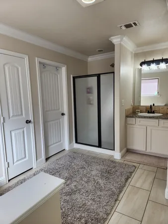 a view of a room with a sink and a window