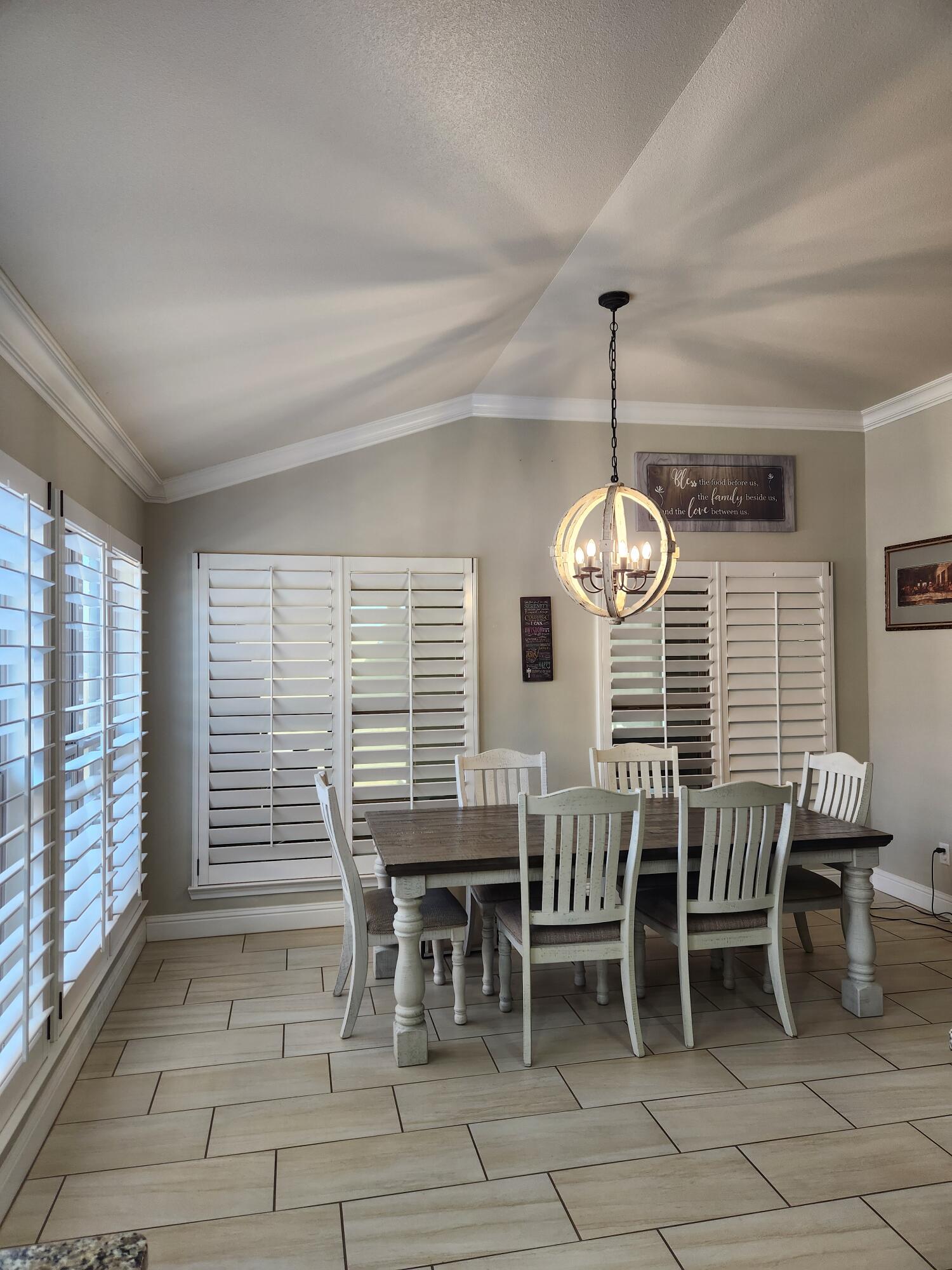 7217 91st Street Lubbock, TX 79424 - Photo 10 of 27 a dining room with furniture window and entryway
