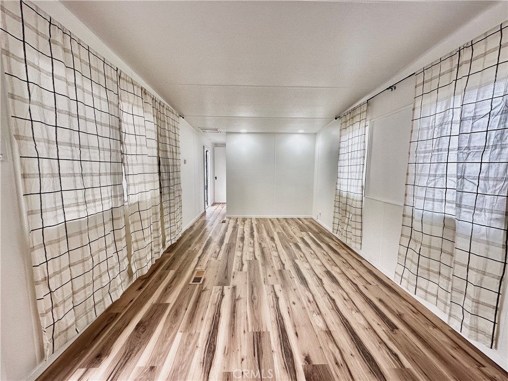 6426 Valley View Street, Unit 9 Joshua Tree, CA 92252 - Photo 12 of 23 a view of wooden floor