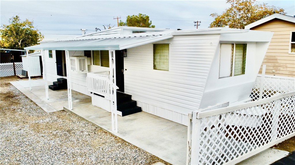 6426 Valley View Street, Unit 9 Joshua Tree, CA 92252 - Photo 3 of 23 a view of a entryway door front of house