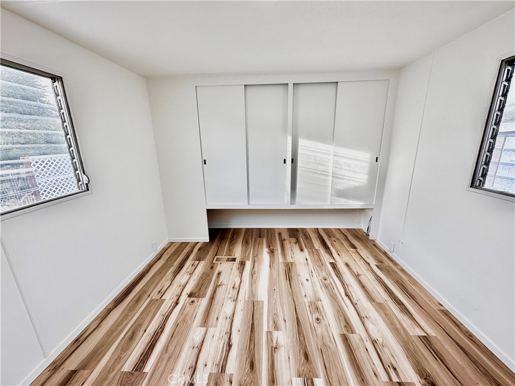 6426 Valley View Street, Unit 9 Joshua Tree, CA 92252 - Photo 6 of 23 a view of room with stairs and a rug