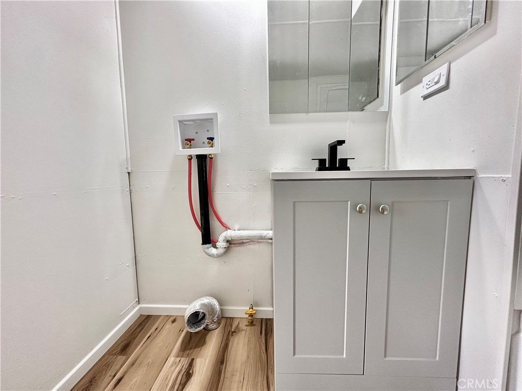 6426 Valley View Street, Unit 9 Joshua Tree, CA 92252 - Photo 9 of 23 a bathroom with a sink and a mirror